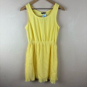 NWT Indulge Yellow Sleeveless Dress Pleated Skirt Short Women’s size medium
